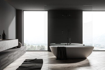 Bathroom interior with shower and bathtub near panoramic window