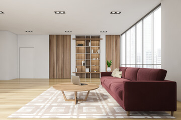 Luxurious bright living room interior with elegant furniture and red couch, in residential apartment. Modern concept for design and architecture. Singapore city view. Panoramic window.