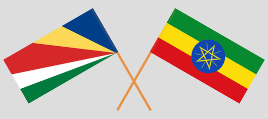 Crossed flags of Seychelles and Ethiopia. Official colors. Correct proportion