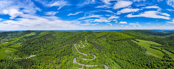Panoramic Drone View Over Lesko and Sanok County, Forest and Curvy Serpentine Road