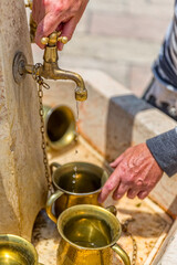 Hand washing Western Wall in Jerusalem