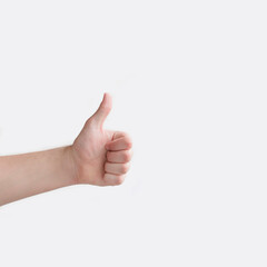 On a white background a man shows a thumb (okay)