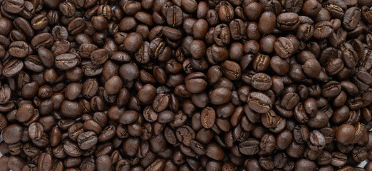 Roasted coffee beans texture background.