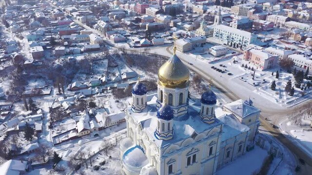 Scenic aerial view of main Orthodox church in Russian city of Yelets, five domed Ascension Cathedral on sunny winter day
