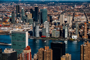 Fototapeta na wymiar New York City - USA - Apr 3 2021: Sunny Day Bird Eye View of East River Long Island City