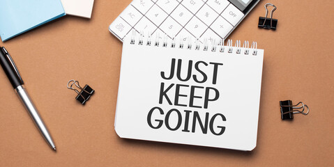 just keep going on notepad with pen, glasses and calculator - obrazy, fototapety, plakaty