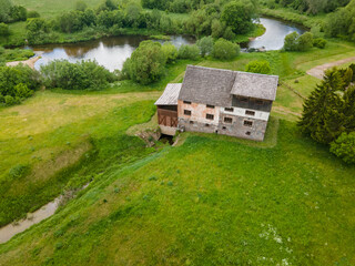 Fototapeta na wymiar Old mill on Dubysa river in rural Lithuania
