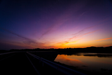 Fototapeta na wymiar sunset over the river