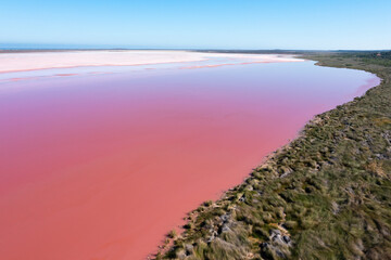 Aerial view of Hutt Lagoon or Pink Lake near Port Gregory in Western Australia, Pink color created...
