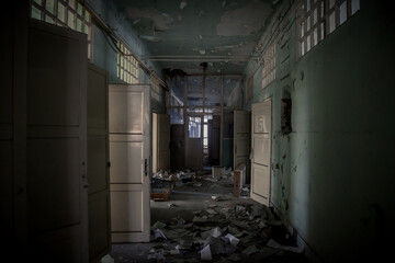 Selective blur on a lobby Interior of an abandoned office building, in a dirty and damaged corridor...