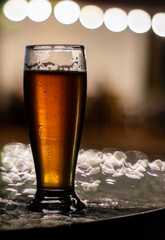 glass of beer with foam