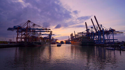 Fototapeta na wymiar Sunset over the port of Hamburg - travel photography