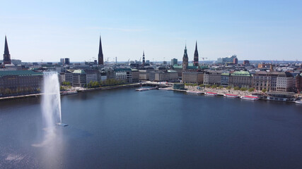 Fototapeta na wymiar Famous fountain on Alster Lake in the city center of Hamburg - aerial photography