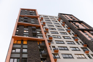 Facades of modern multi-storey buildings in Moscow. In New Moscow, we photograph houses from the bottom up.