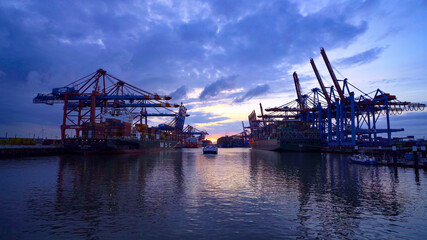 Fototapeta na wymiar The impressive Port of Hamburg with its huge container terminals - travel photography