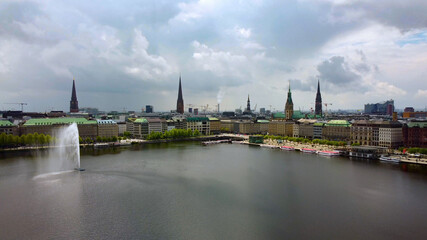Famous fountain on Alster Lake in the city center of Hamburg - aerial photography