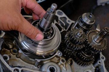 Close-up of the new engine connecting rod of a motorcycle.
