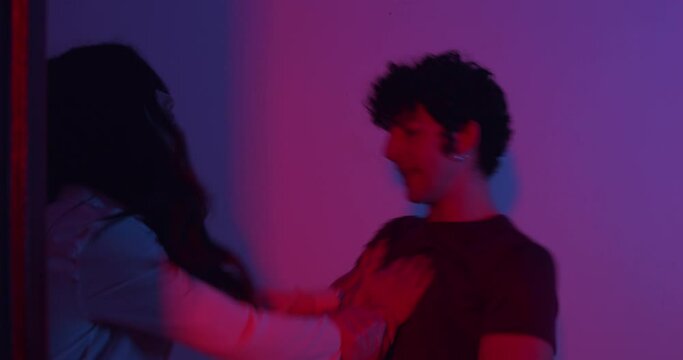 furious quarrel - angry woman throws her boyfriend out of the house