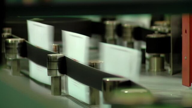 Letters on Sorting Machine at Postal Service Distribution Center. Close Up.