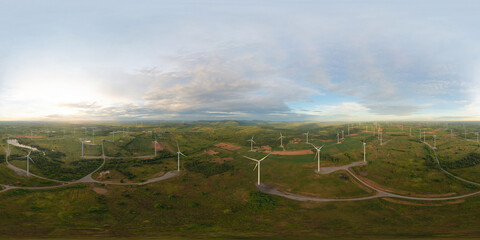 360 panorama by 180 degrees angle seamless panorama of aerial view of wind turbines or windmills...