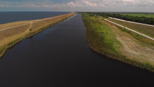 Aerial view of a river along Lake Okeechobee. Drone flight.