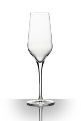 Champagne flute on white background with a gradient reflection on white plexiglass.