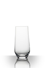 Tall rocks glass on white background with a gradient reflection on white plexiglass.