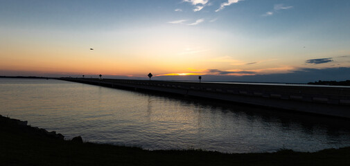 Fototapeta premium sunset over the river