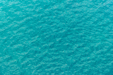 Blue sea surface with waves
