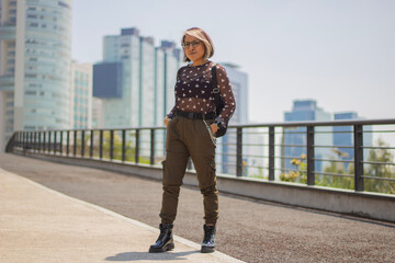 Naklejka premium woman walking on the street