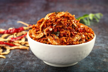 Bowl of delicious and spicy dried prawns chutney with coconut and spices. Kerala foods.