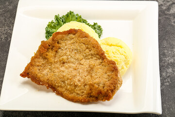 Crispy chicken schnitzel with mashed potato