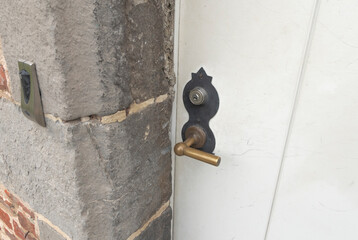 New installation of the door lock to the ancient building style of old with an electronic security system