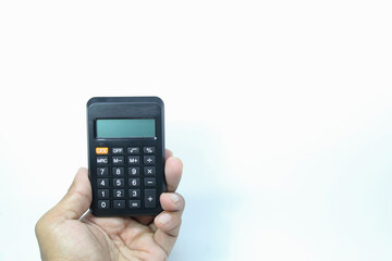 the concept of a hand is holding a calculator with a white background