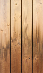 Naklejka premium Vertical wooden background. Orange and yellow colors for your designs