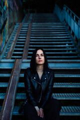 Beautiful woman evening portrait in the city