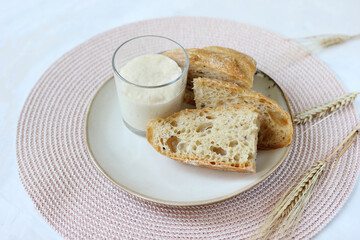 Starter sourdough, fermented mixture of water and flour to use as leaven for bread baking. The concept of a healthy diet
