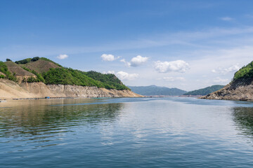 Fototapeta premium Lakes, hills and woods in Dandong, China, in spring.