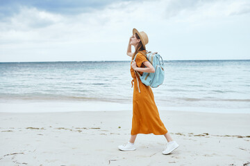Fototapeta na wymiar woman hiker backpack vacation travel beach landscape