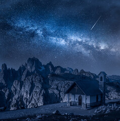 Milky way over chapel, Dolomites. Mountain path to Tre Cime.