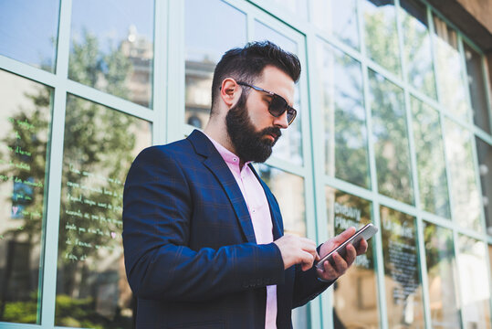 Businessman with smartphone
