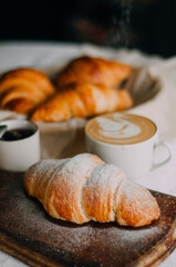 croissant and cup of coffee