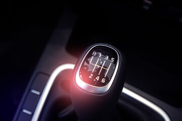Manual transmission gear shift of a modern vehicle.