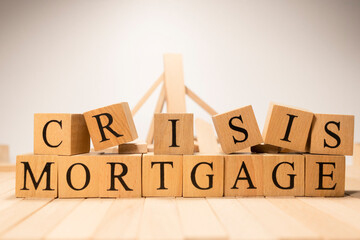 The word Crisis mortgage was created from wooden cubes. Business and market.