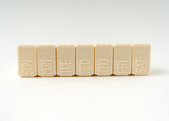 Medicine tablet container isolated on white background.