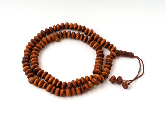 Rosary beads isolated on white background.