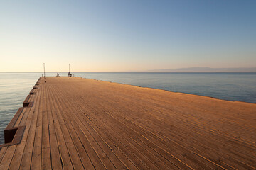 Sea Pier in the early morning (oblique view to horizon)