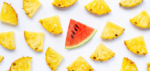 Watermelon slice with pineapple slices on white background.