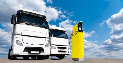 Electric trucks with charging station. Concept  © scharfsinn86