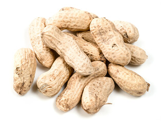 handful of unshelled peanuts closeup on white